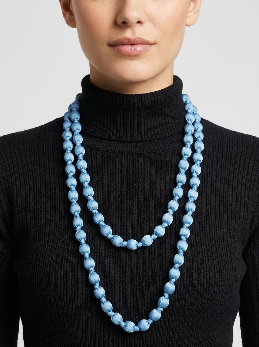 Collana Il Baco Da Seta Palline di seta blu dei Puffi