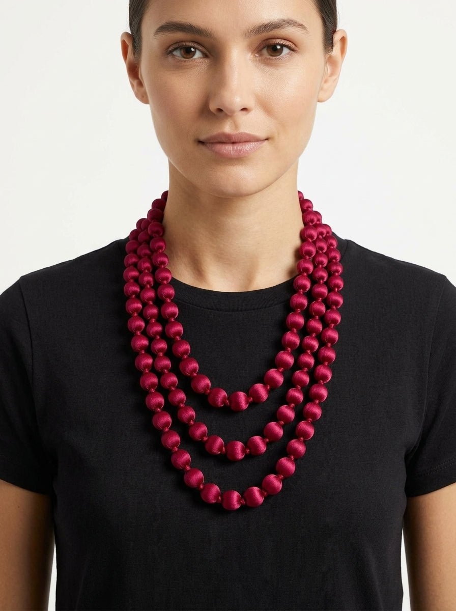 Collana  Il Baco Da Seta Palline di seta granato
