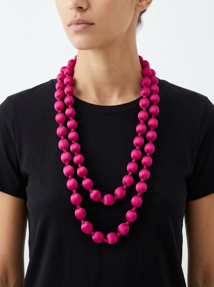 Collana il Baco Da Seta Maxi palline di seta fucsia vibrante
