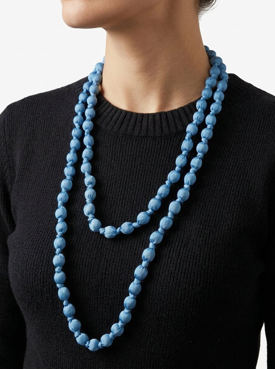 Collana Il Baco Da Seta Palline di seta blu dei Puffi