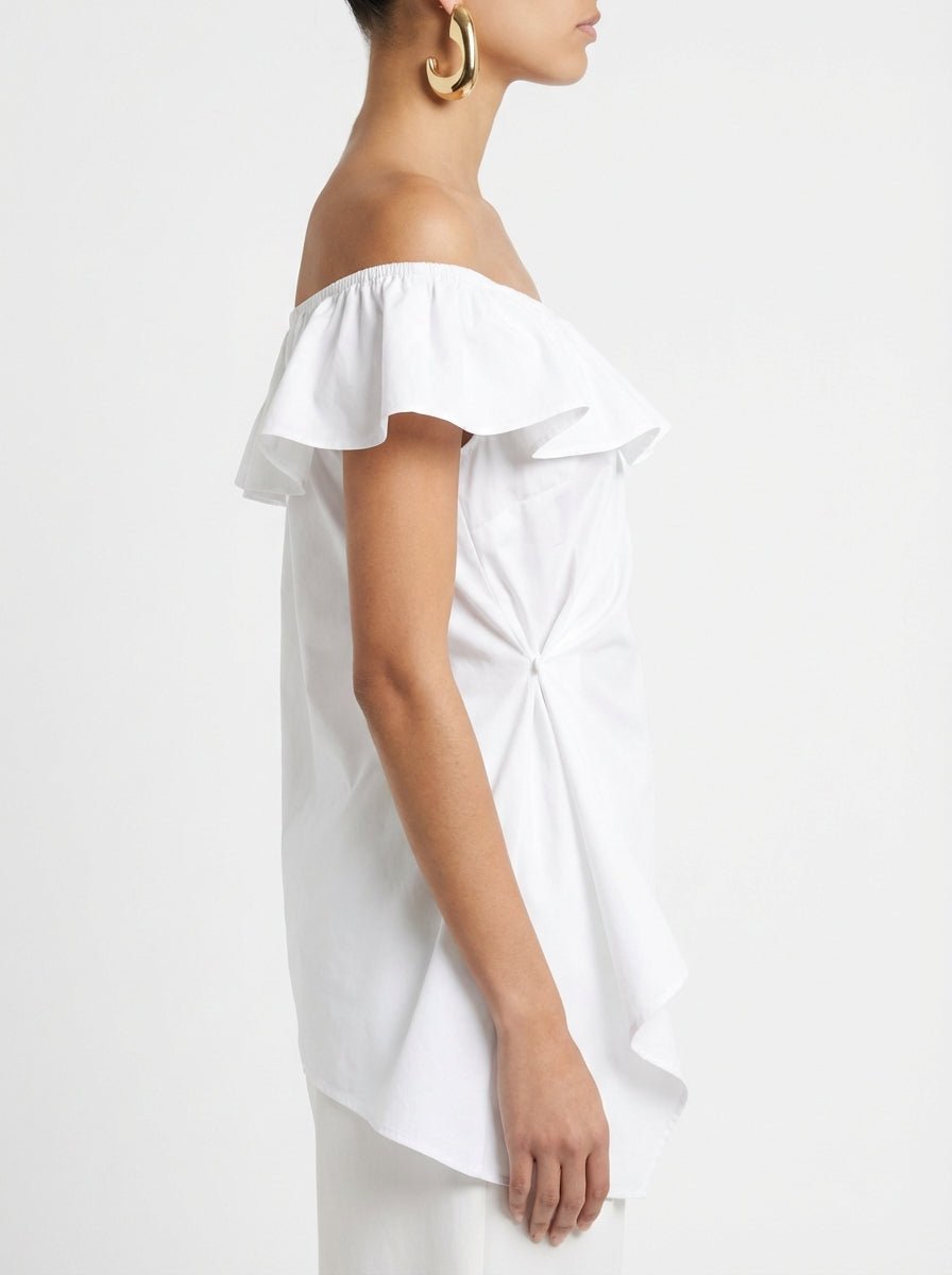 Haut SU blanc asymétrique à volants